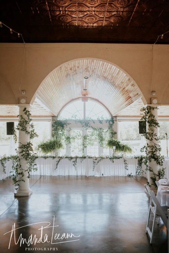 elegant wedding table set up in outdoor wedding pavilion